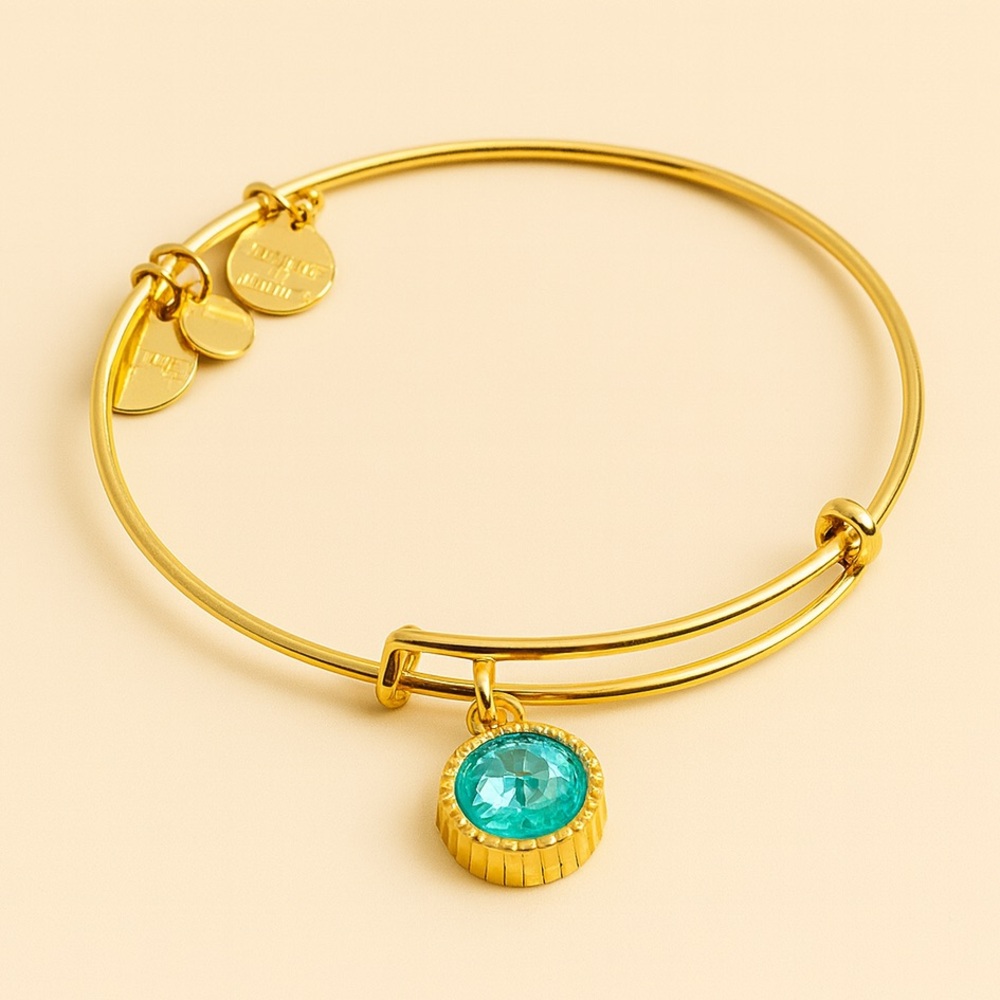 NWOT Alex and Ani Aquamarine Stone Bracelet gold tone Peace energy blue March